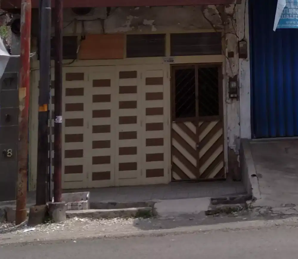 Pintu ruko kayu jati