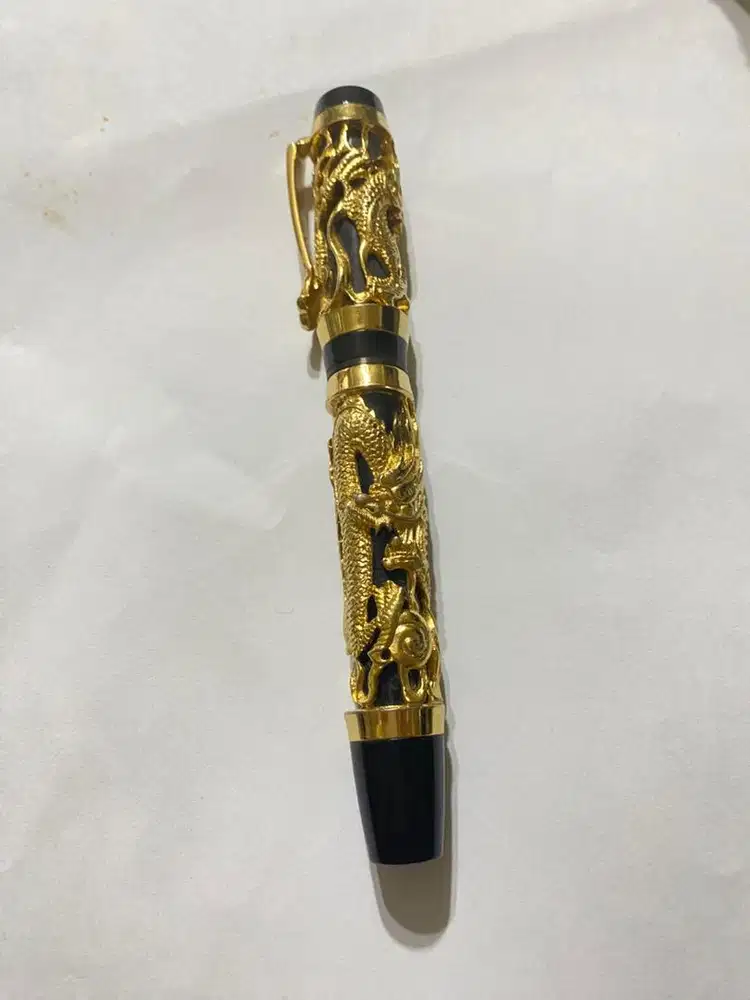 Pena motif naga merk Artex