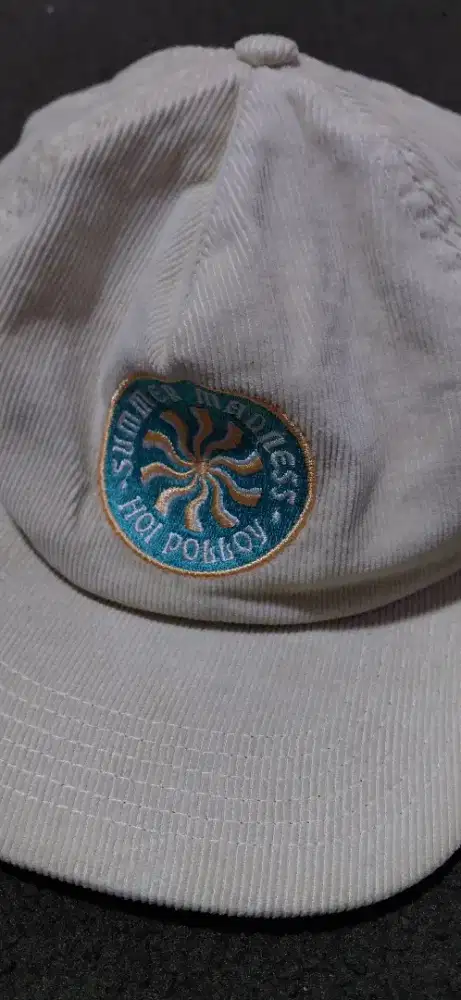 Topi Selancar Pantai