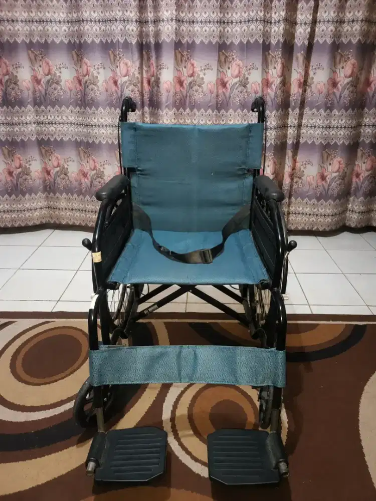 Kursi roda merek guardian
