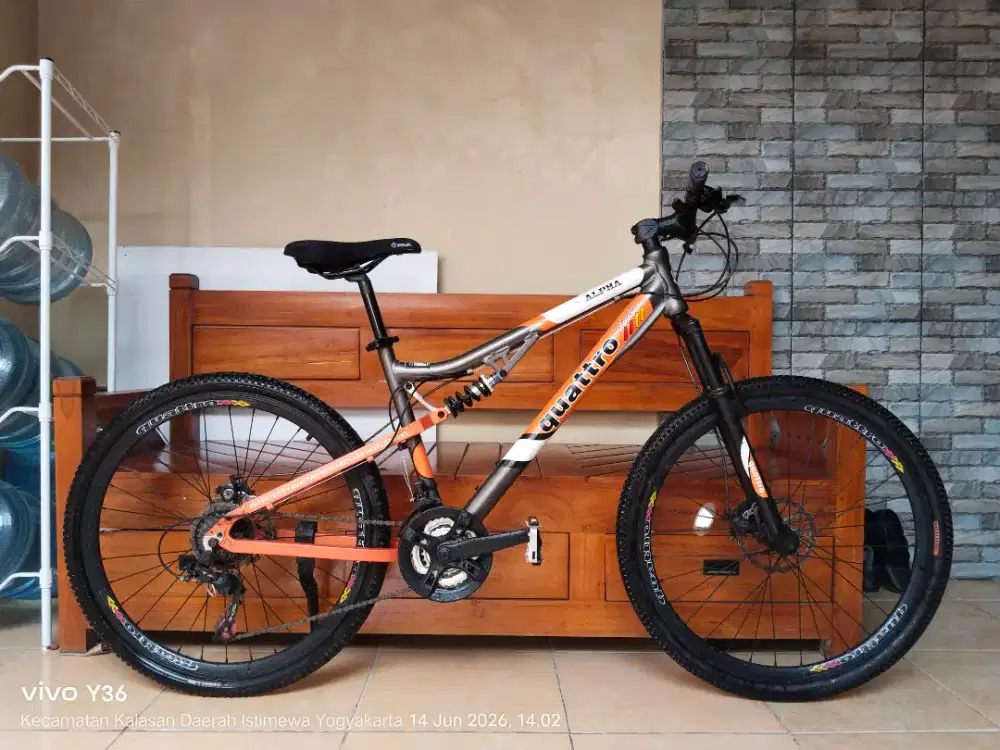 Sepeda quattro alpha