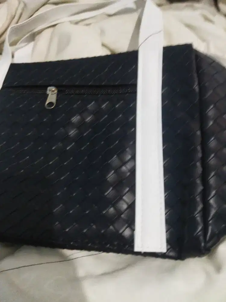 tas kosmetik anyam