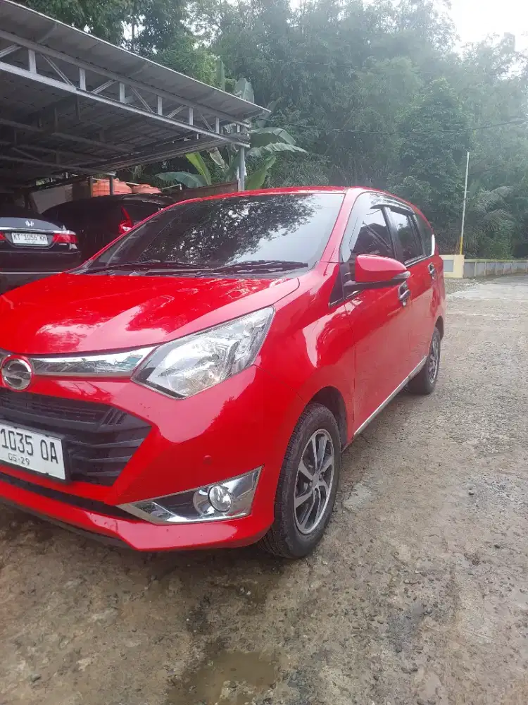 Sigra R Deluxe 1,2 Manual