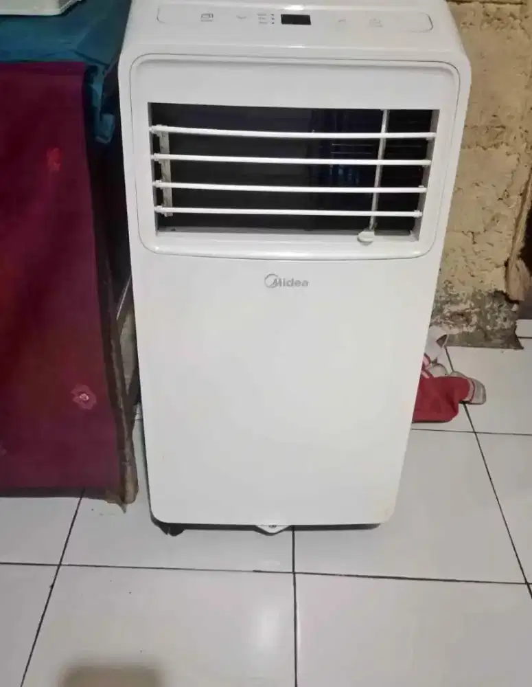 AC portabel Midea 1/2pk