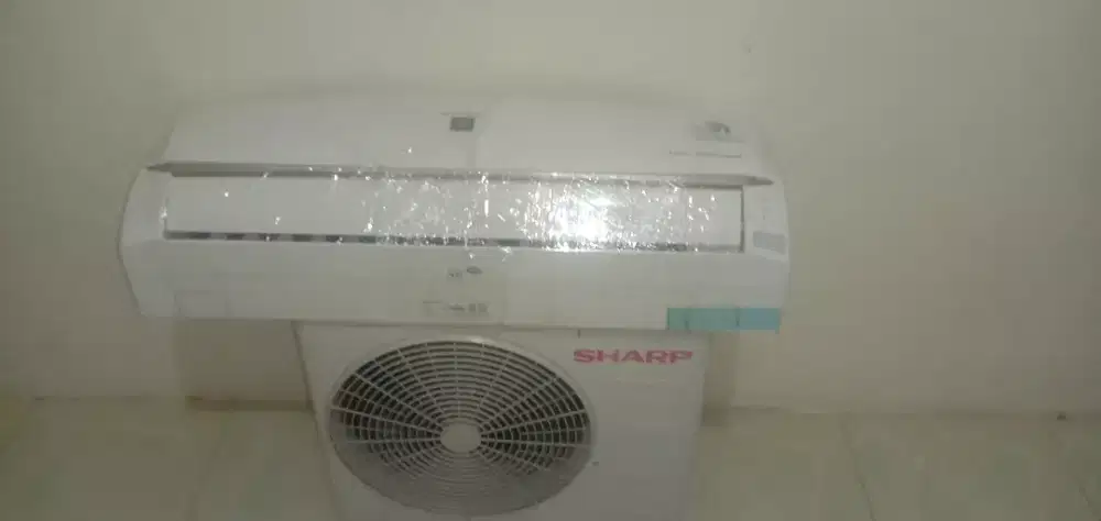 Ac sharp 0,5pk + pasang bergaransi