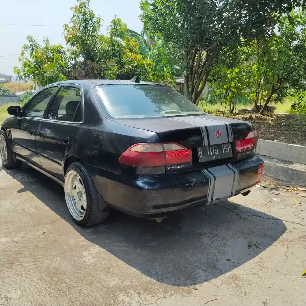Honda acord 2003 metik