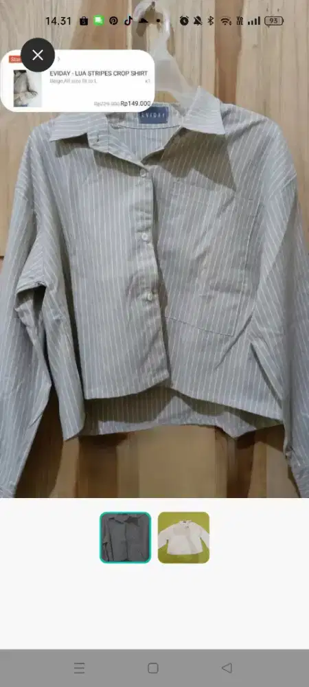 Atasan stipe Preloved dengan kondisi terawat