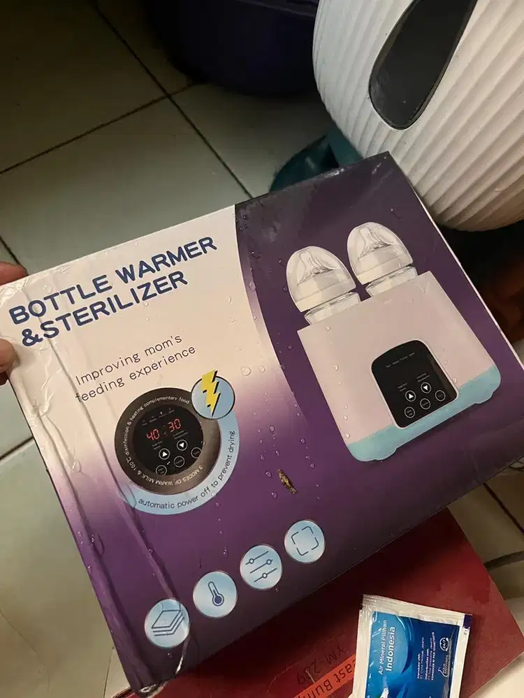 Steril botol dan mengahangatkan ASI