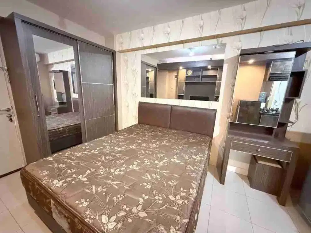 Studio furnished tahunan apartemen Bassura City tower Edelweiss coklat