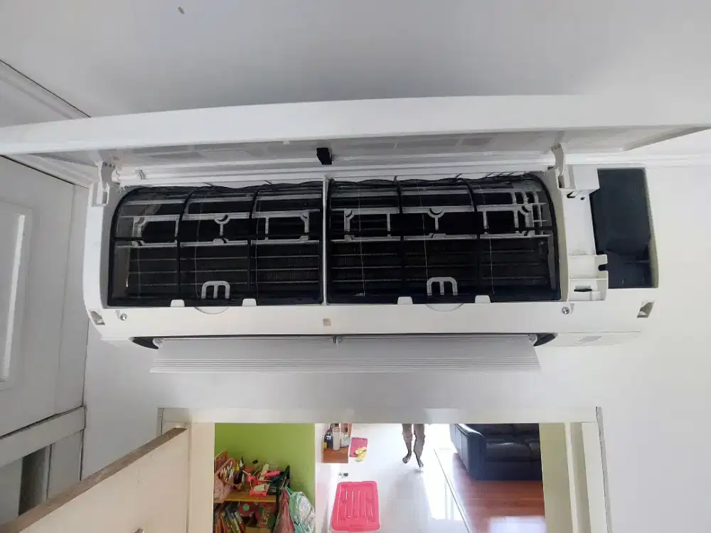 SERVICE AC BONGKAR PASANG CUCI AC