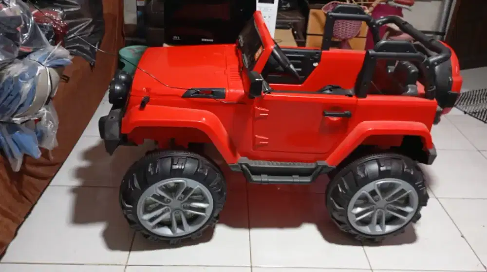 Mobil aki mainan bocah