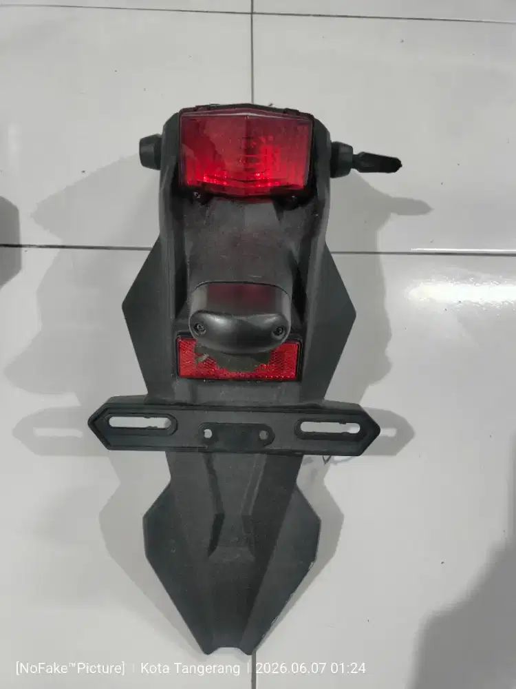 Spakbor belakang Kawasaki D-Tracker 150