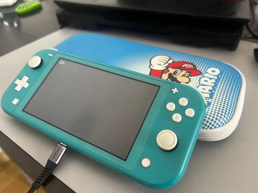 Nintendo Switch Lite Turquoise + 6 Game Original + Case Mario