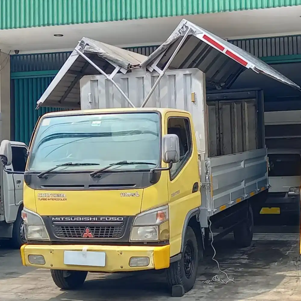 Truk Mitsubishi canter engkel long CASIS wing box 2013