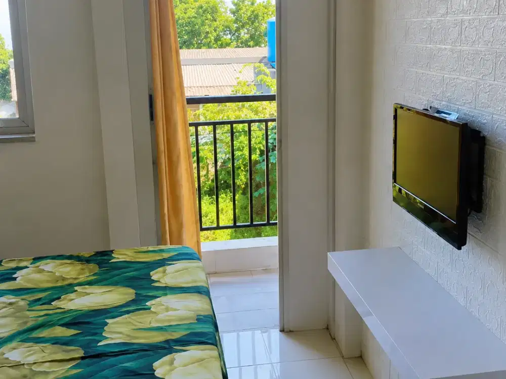 Disewakan Apartemen Purimas Gunung Anyar Rungkut Surabaya Type Studio Full Furnished Lantai 2 Hadap Pool