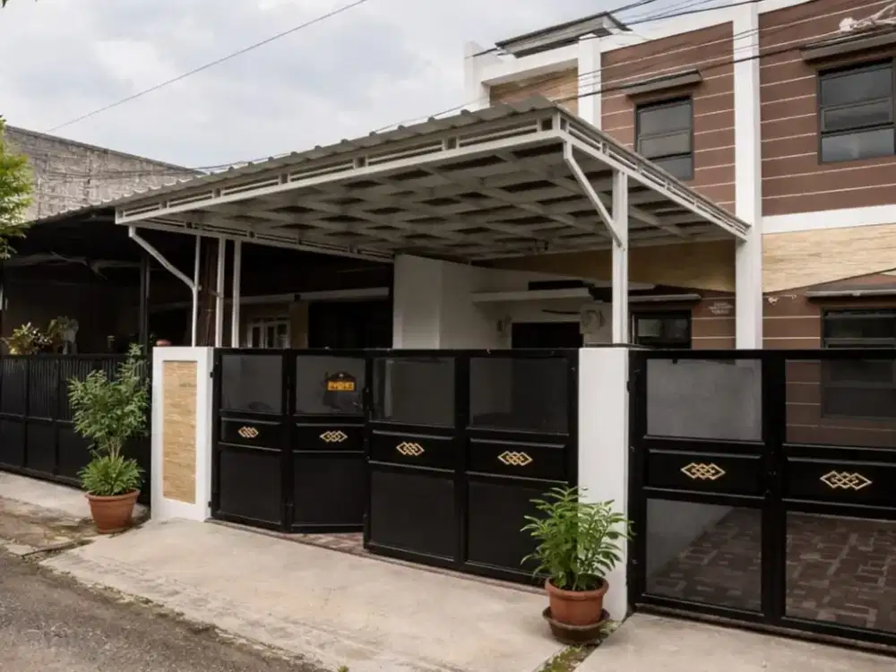 Rumah Cantik Siap Huni dengan 4 Kamar dan Carport luas di Cisaranten Arcamanik