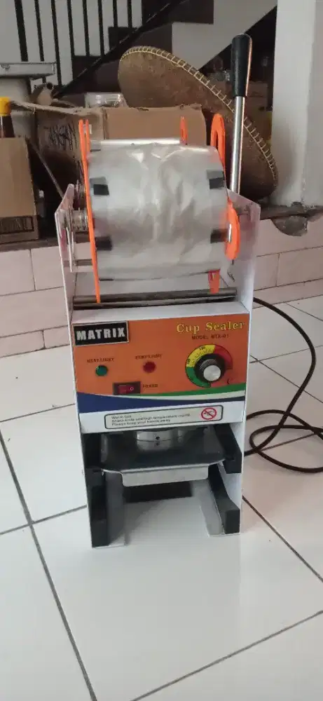 Mesin cup sealer
