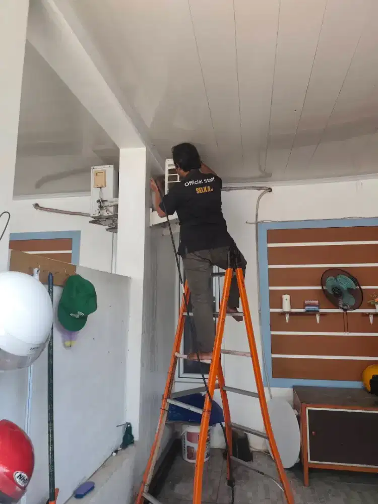 SERVICE AC BONGKAR PASANG AC CUCI AC