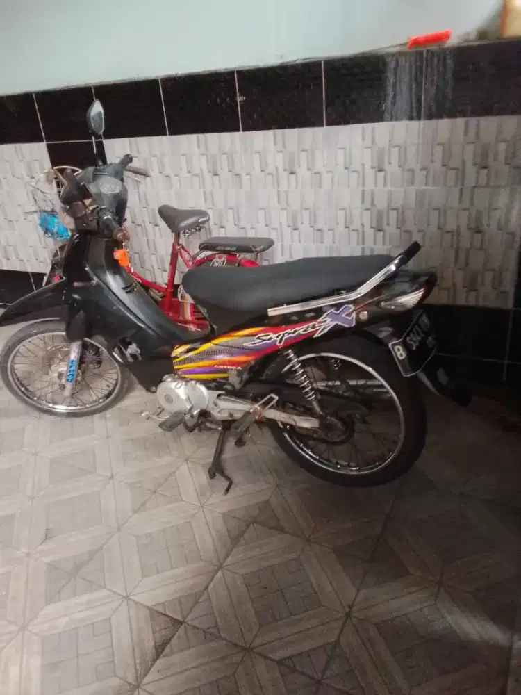 Honda Supra x carbu th 2003
