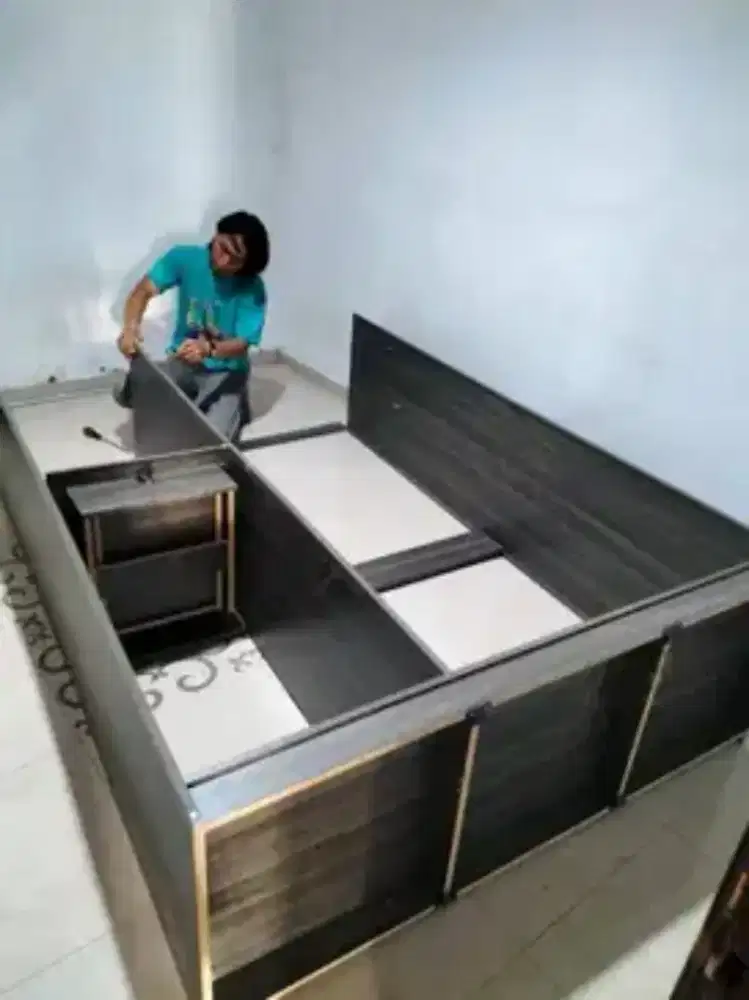 Jasa Rakit Lemari & bongkar Lemari Jenis Olympic packing knockdown.