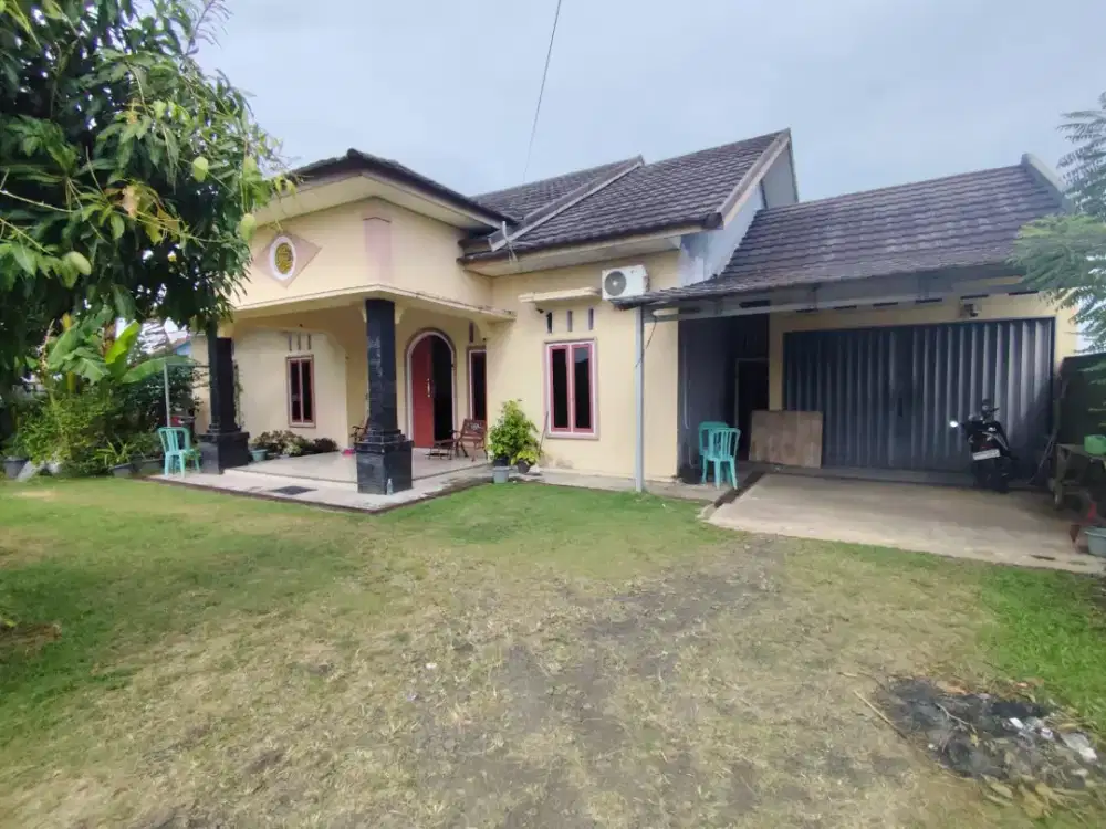 Rumah pinggir Jalan lintas