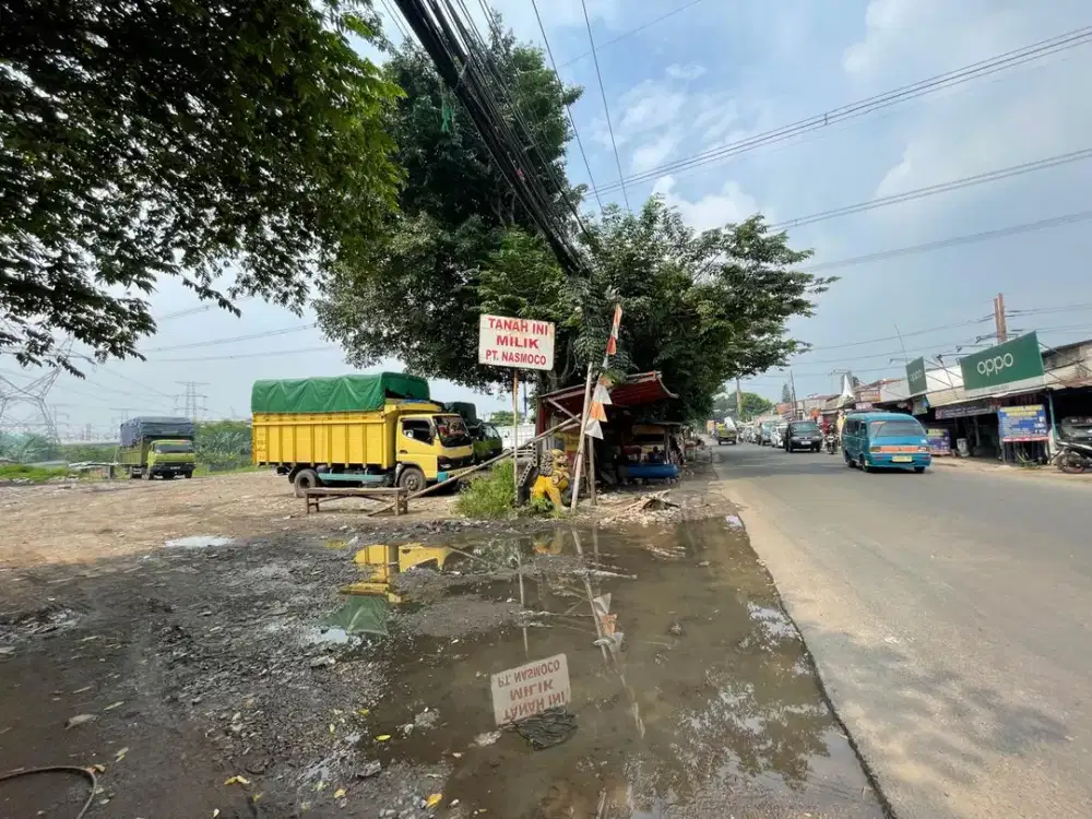 TANAH  DI PINGGIR JALAN RAYA BOGOR SELANGKAH KE TOL GUNUNG PUTRI DIJUAL CEPAT MURAH