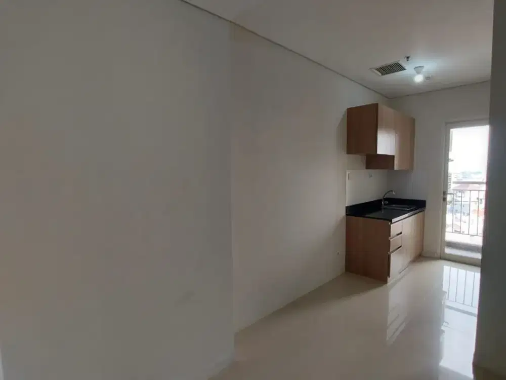 1BR Unfurnished Apartemen Madison Park - Mall Central Park