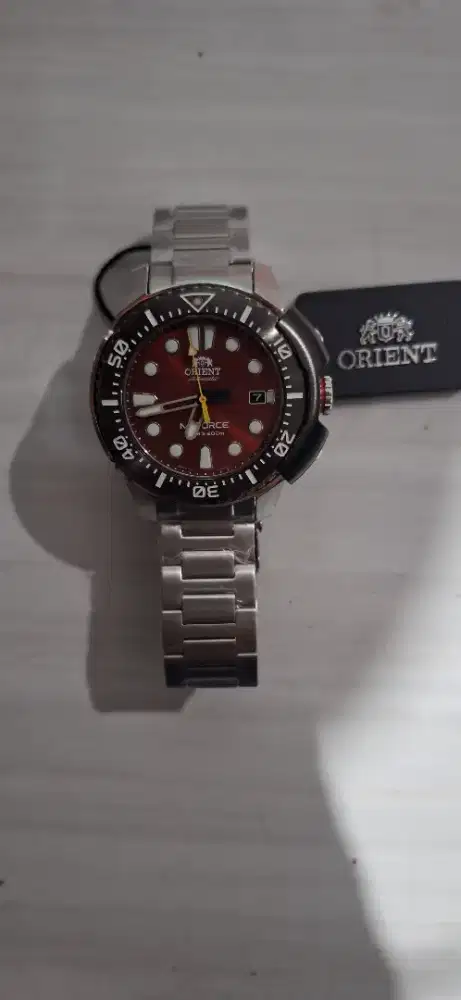 Orient m force   dial merah marun
