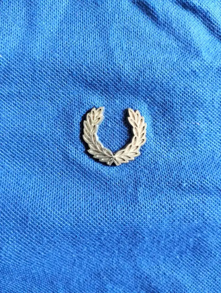 Polo shirt pria