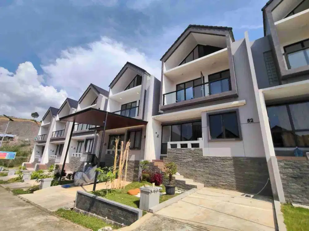 Rumah baru 2 lantai disewakan semi furnished.siap huni lingkungan asri .view pegunungan.15 menit dari exit tol Sentul City