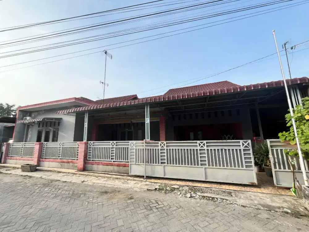 Dijual rumah di Perumahan Tasri Stabat dua kapling
