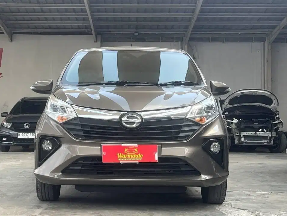Daihatsu Sigra 1.2 R Matic AT tahun 2021 coklat DP minim 16 juta