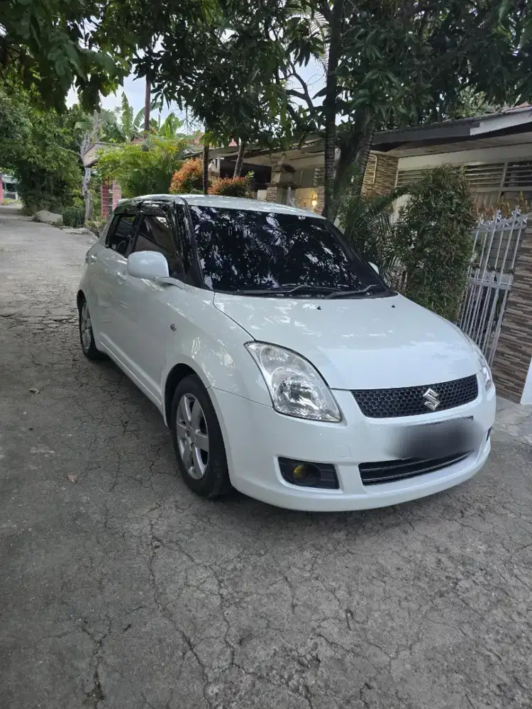 DIJUAL SWIFT ST M/T 2011