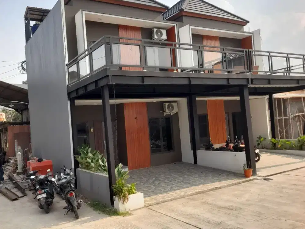 Rumah 2lantai pinggir jalan raya jatiwarna design modern cuma 900 juta an