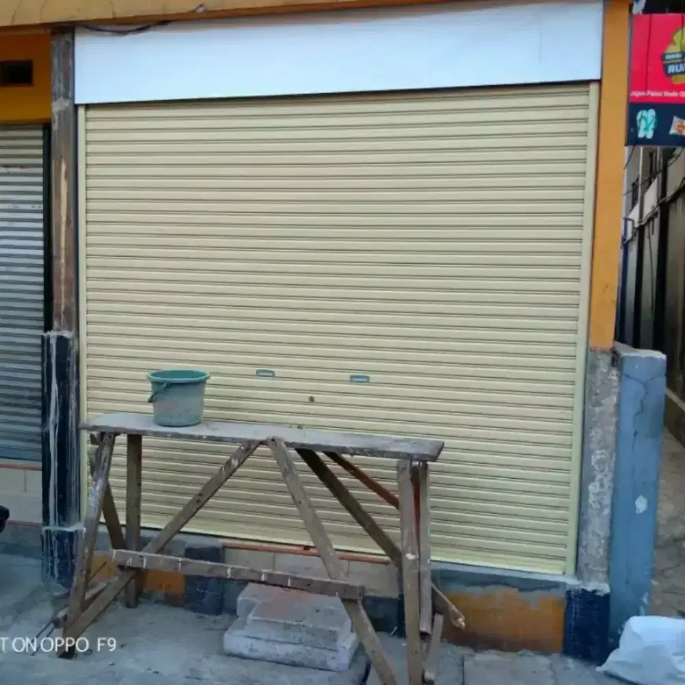 Tukang perbaikan rolling door folding gate murah