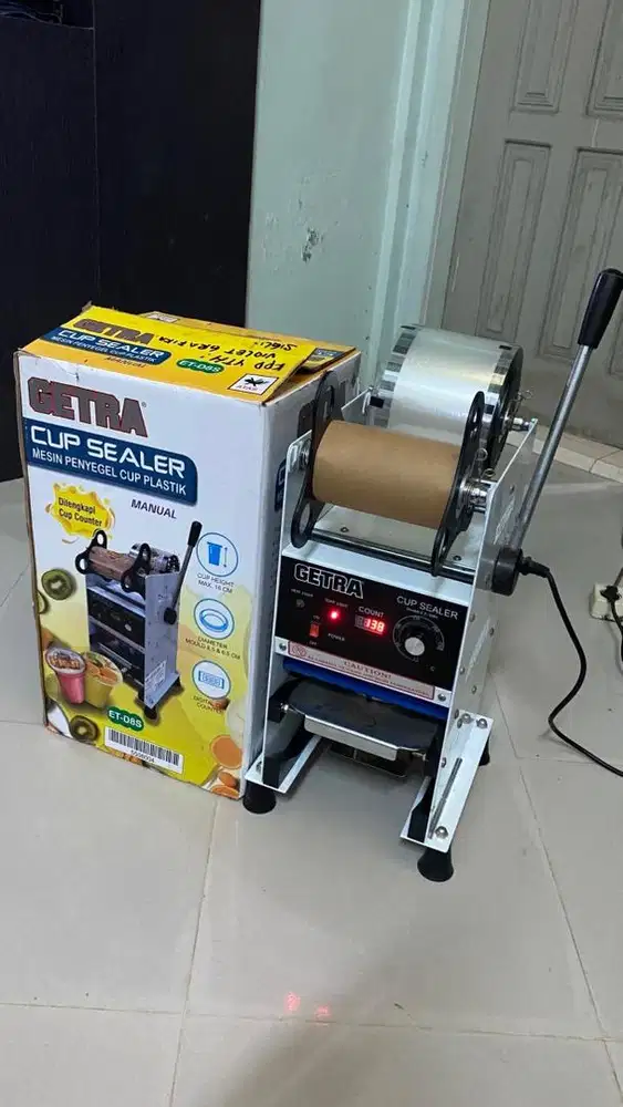 Mesin press Cup untuk jualan jus