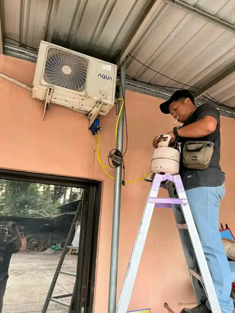 Service AC bongkar pasang AC