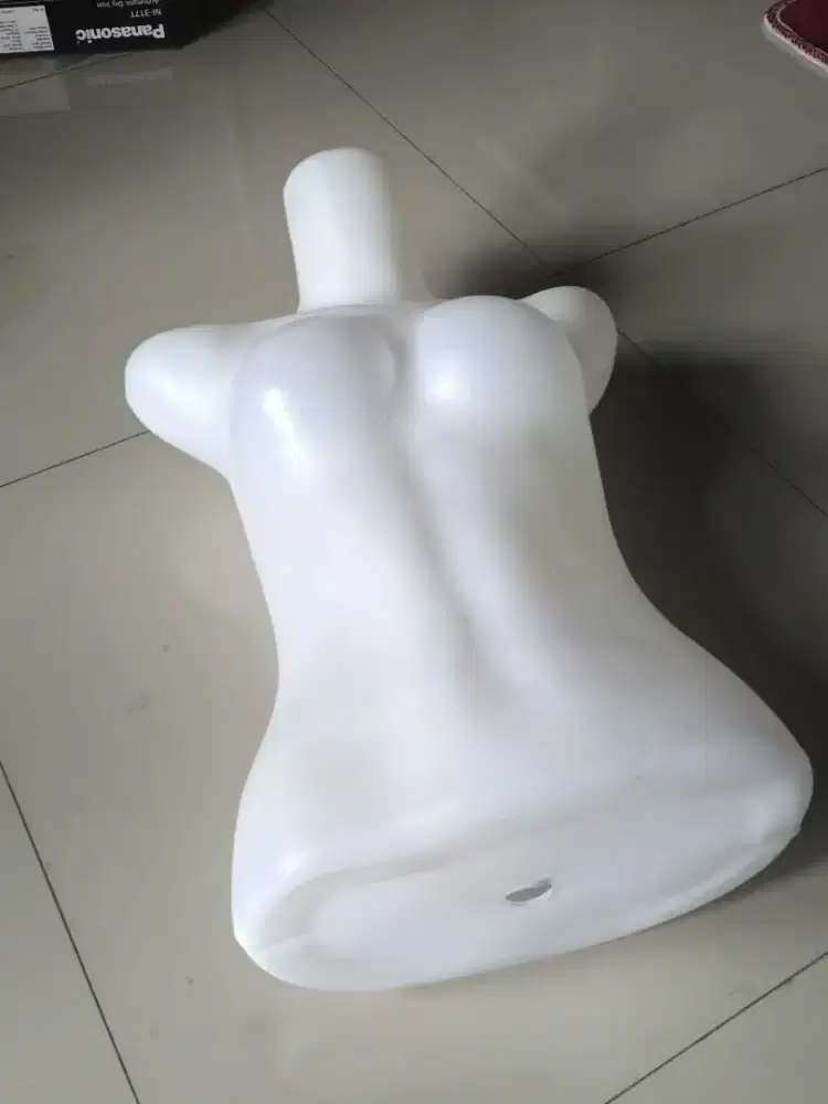 Menakin Patung baju