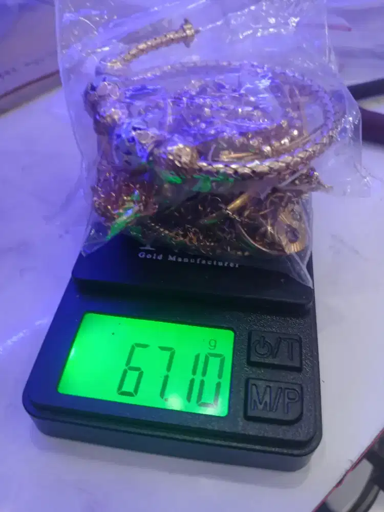 menerima emas dengan kondisi apa pu