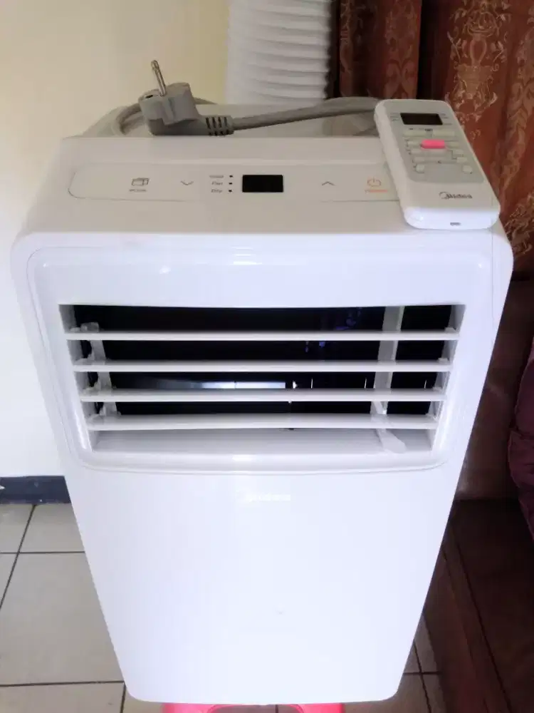 Ac portable midea 1/2 PK