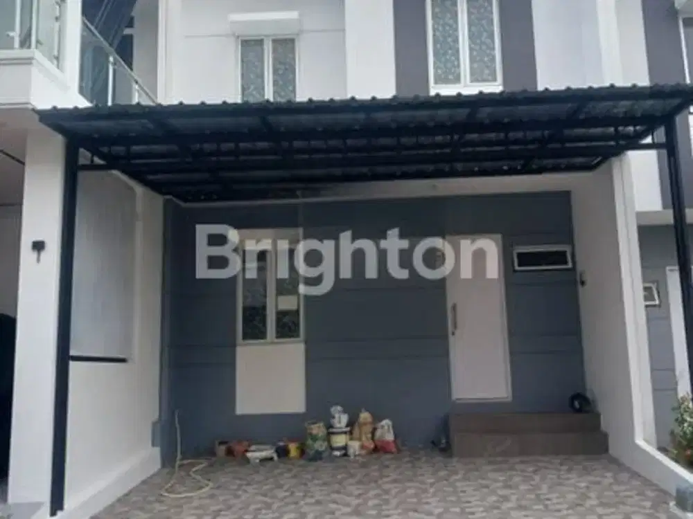 RUMAH MINIMALIS DUA LANTAI DI PERUMAHAN GRAND CITY