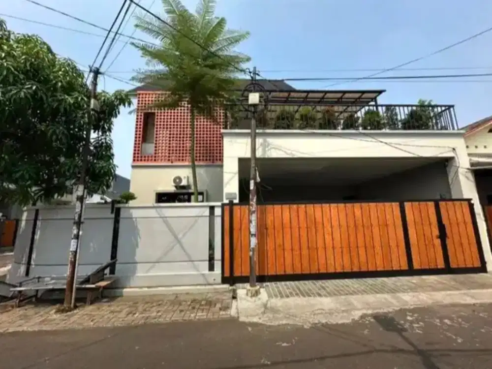 Rumah 2 lantai 3+1 kamar dekat pasar modern di Griya Loka