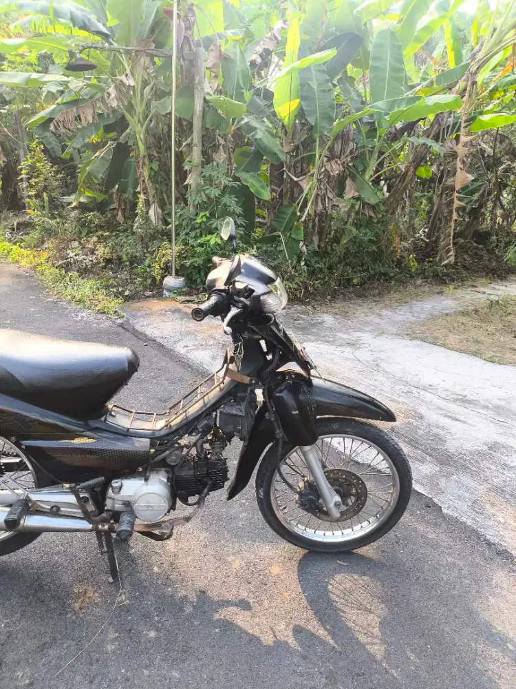 Supra X 100 tahun 2002