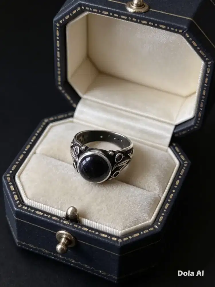 Men's silver and gold ring with black onyx gemstone
