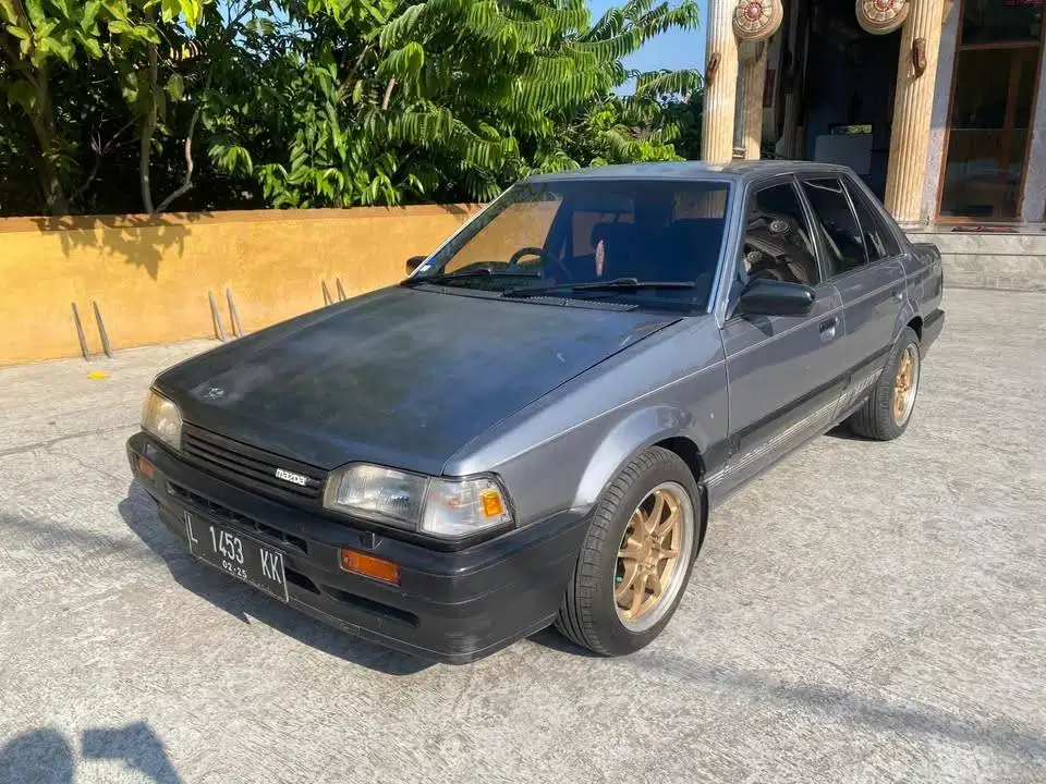 mazda 323 1988 winda bisa tukar tambah sekoto badas