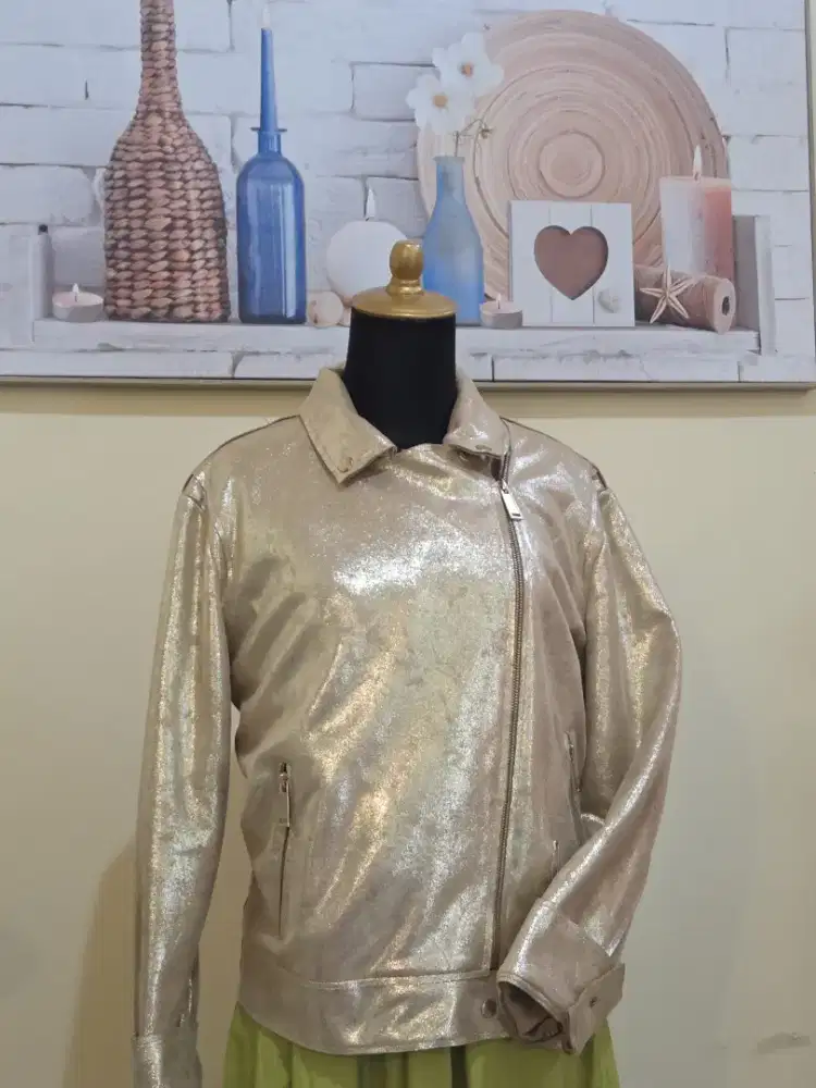 Dijual Jaket Hijau Milenium from Qatar