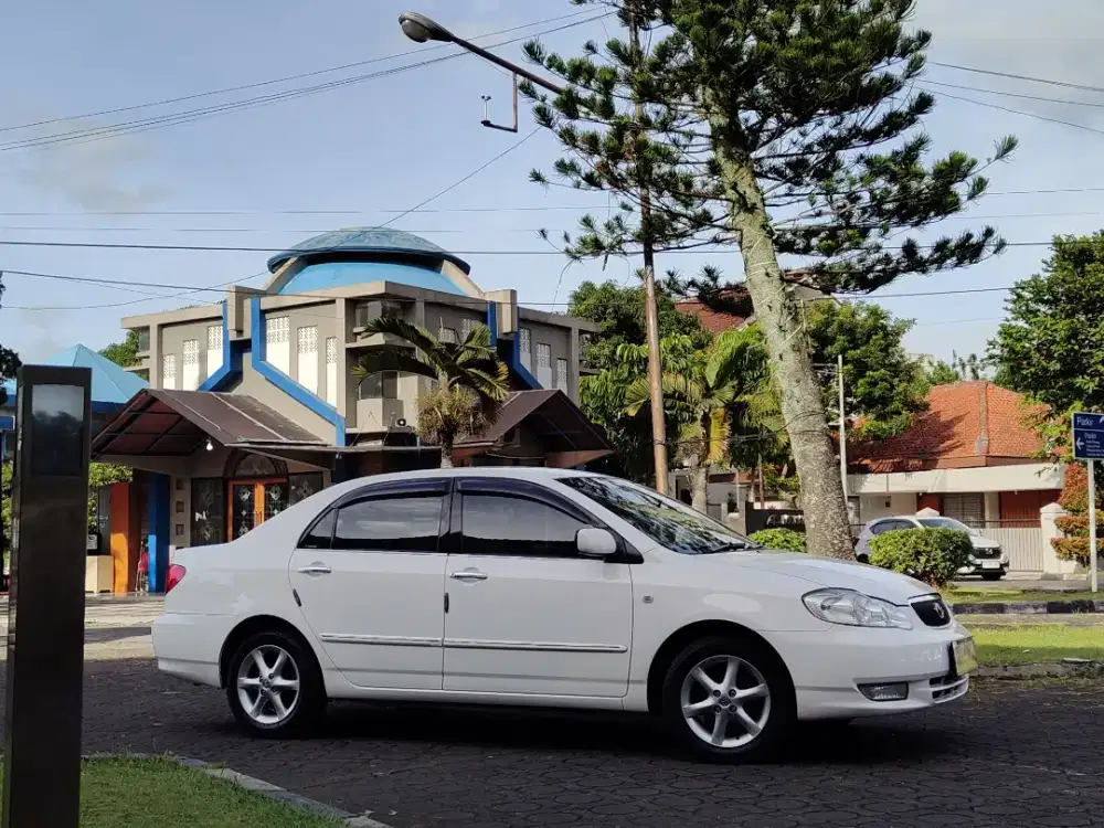 Corolla Altis G 2001 Matic Putih Antik Ban baru Jok Kulit