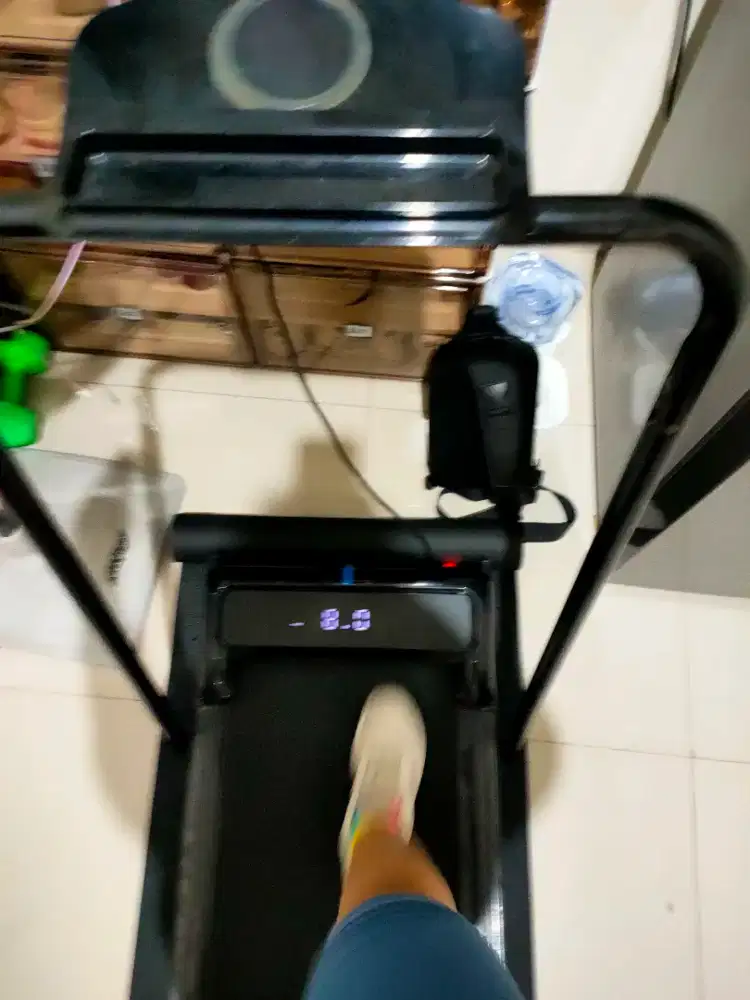 Treadmill running pad