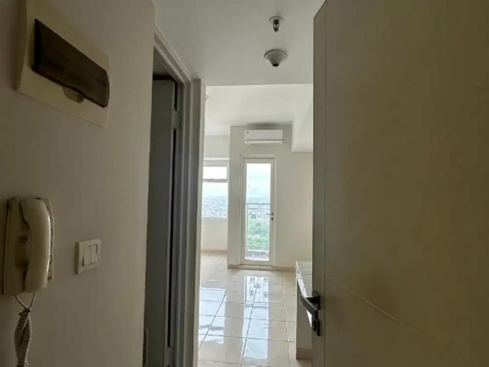 Apartemen murah ada AC di springlake summmarecon Bekasi
