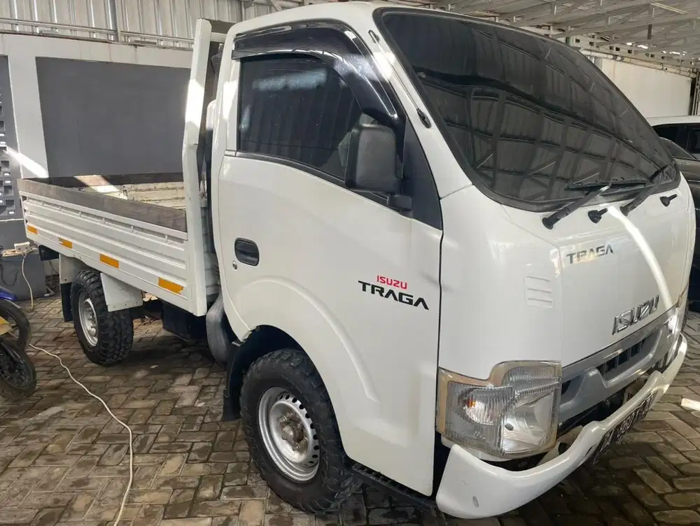 Mobil Traga Pik up Pakain Rumahan